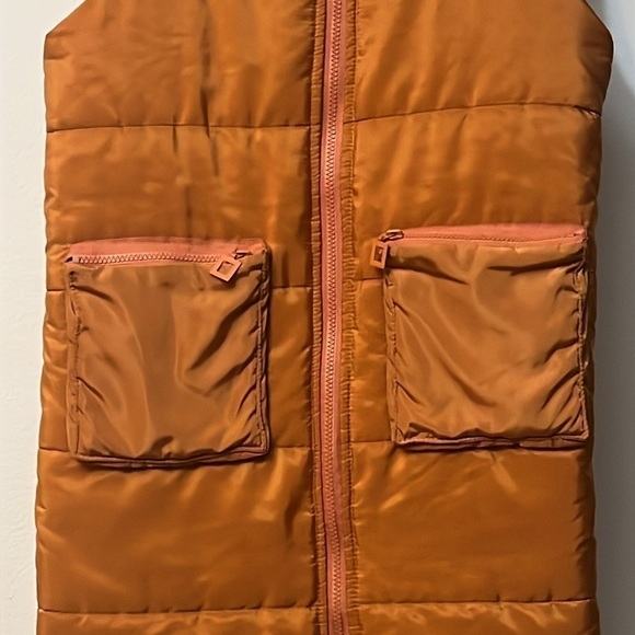 Unbranded orange puffer vest pit to pit 19”
Length 32” - Picture 2 of 8